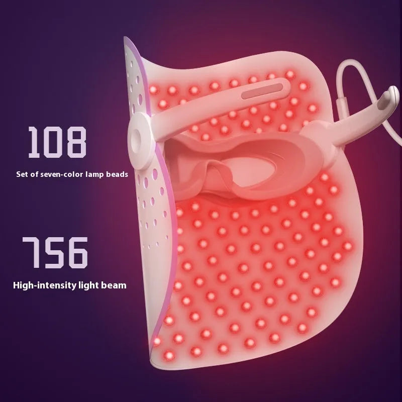 White and purple photon IPL beauty mask facial device on a flat surface