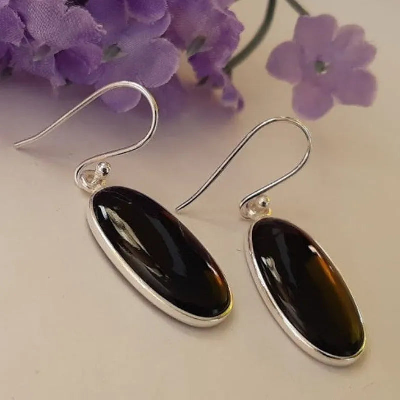 Women's geometric silver earrings with black agate oval pendants on silver chain