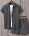Men's black and white jacquard short sleeve suit set with matching shorts on hanger