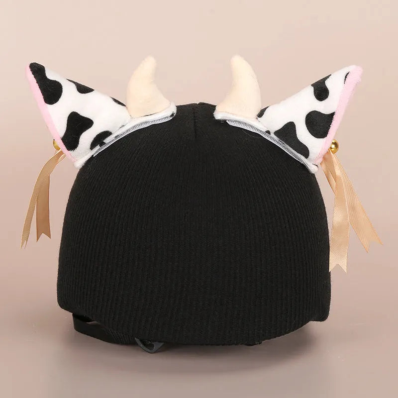 A soft plush cartoon character helmet cover for ears, shown in M size.