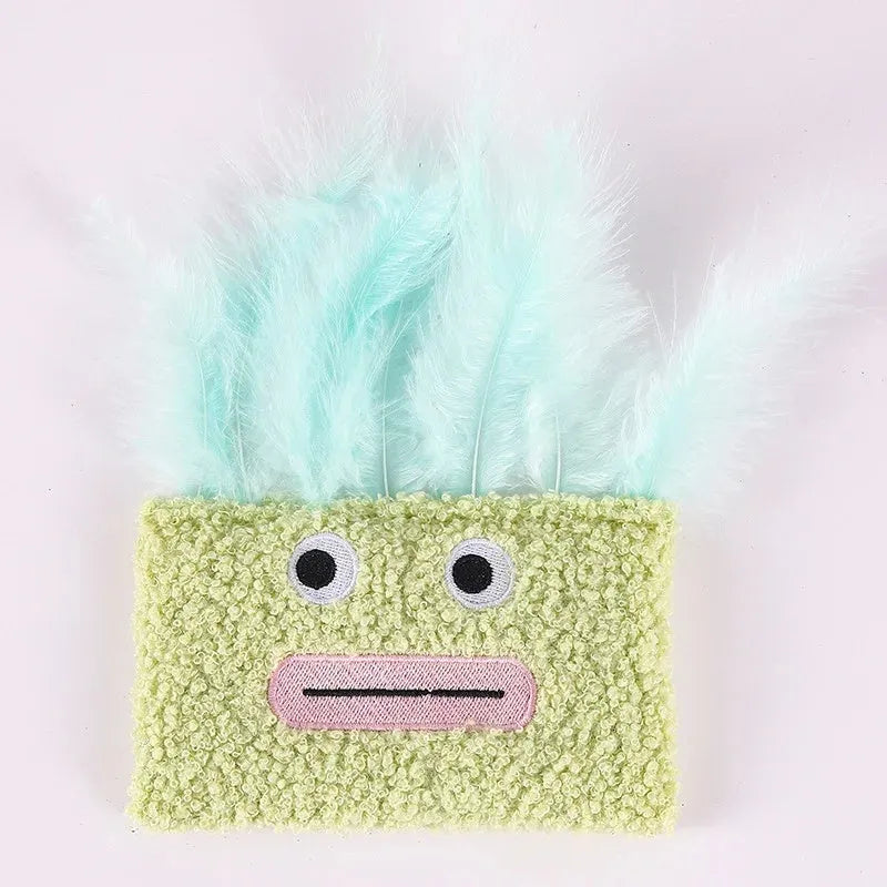 Colourful catnip plush toy with explosion head shape in blue, green, orange, and purple options