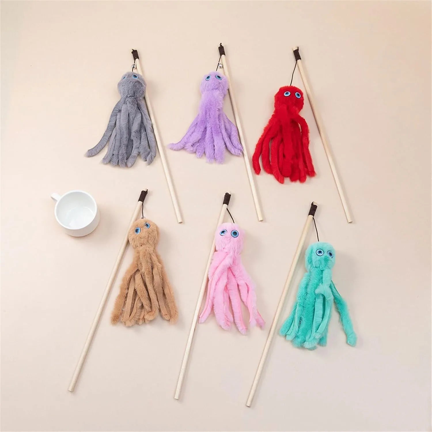 Colourful octopus cat toy with eyes on a long stick for interactive indoor play with kittens and cats