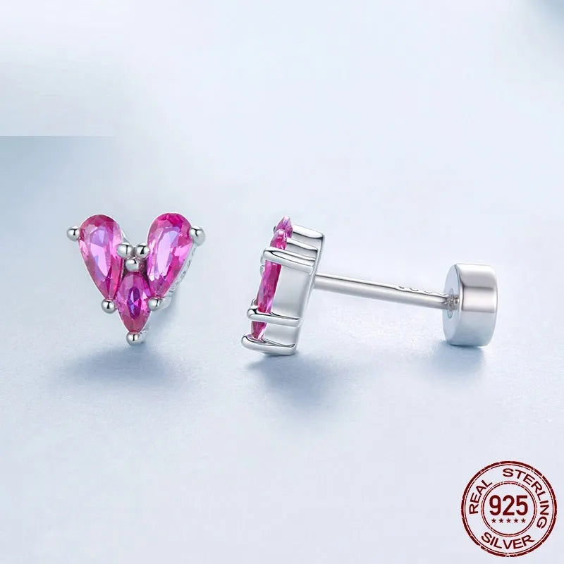 Rose red heart shaped 925 silver small ear studs for women on white background
