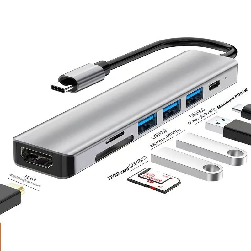 A Type-C multi-function expansion dock with HDMI, USB ports, and card slots on a 15 cm cable.