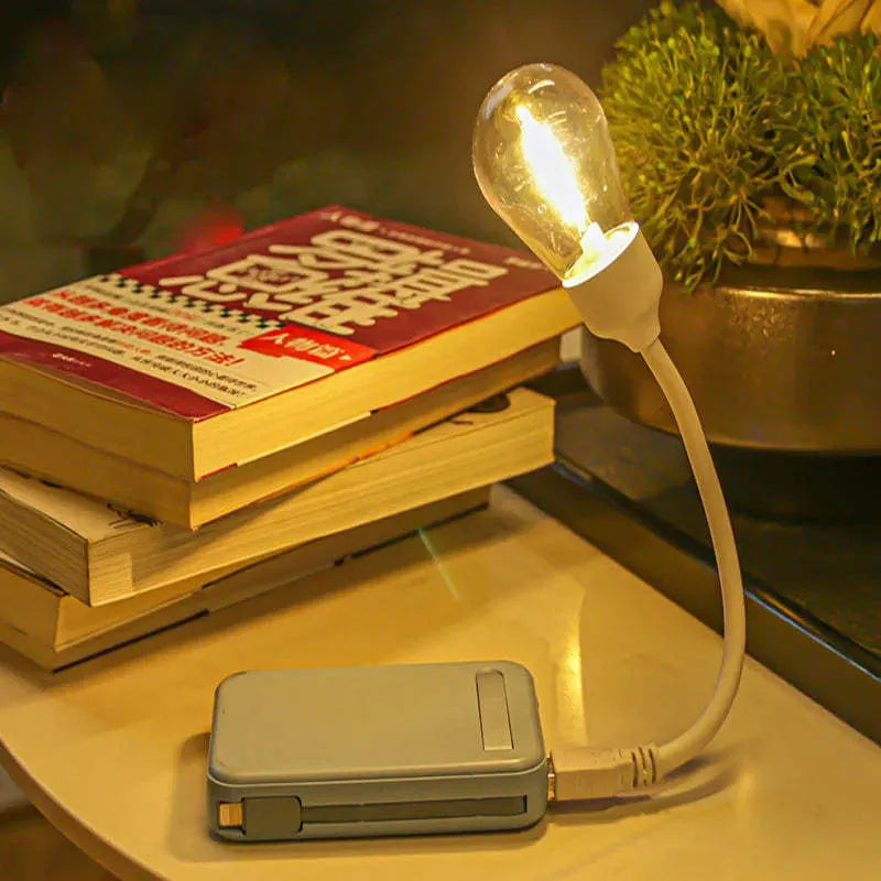 USB rechargeable folding night light with tungsten S14 bulb in warm white colour