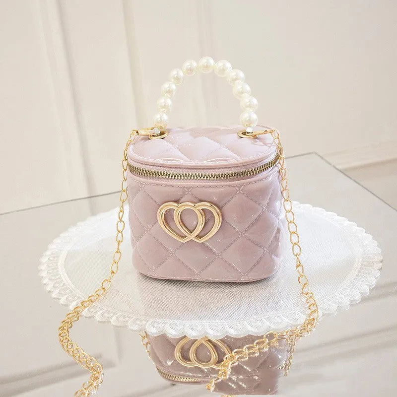 White heart-patterned PVC bucket gel bag for women showing bucket shape and heart design