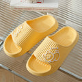 Green cat-themed platform flip-flop slippers with a thick EVA sole.