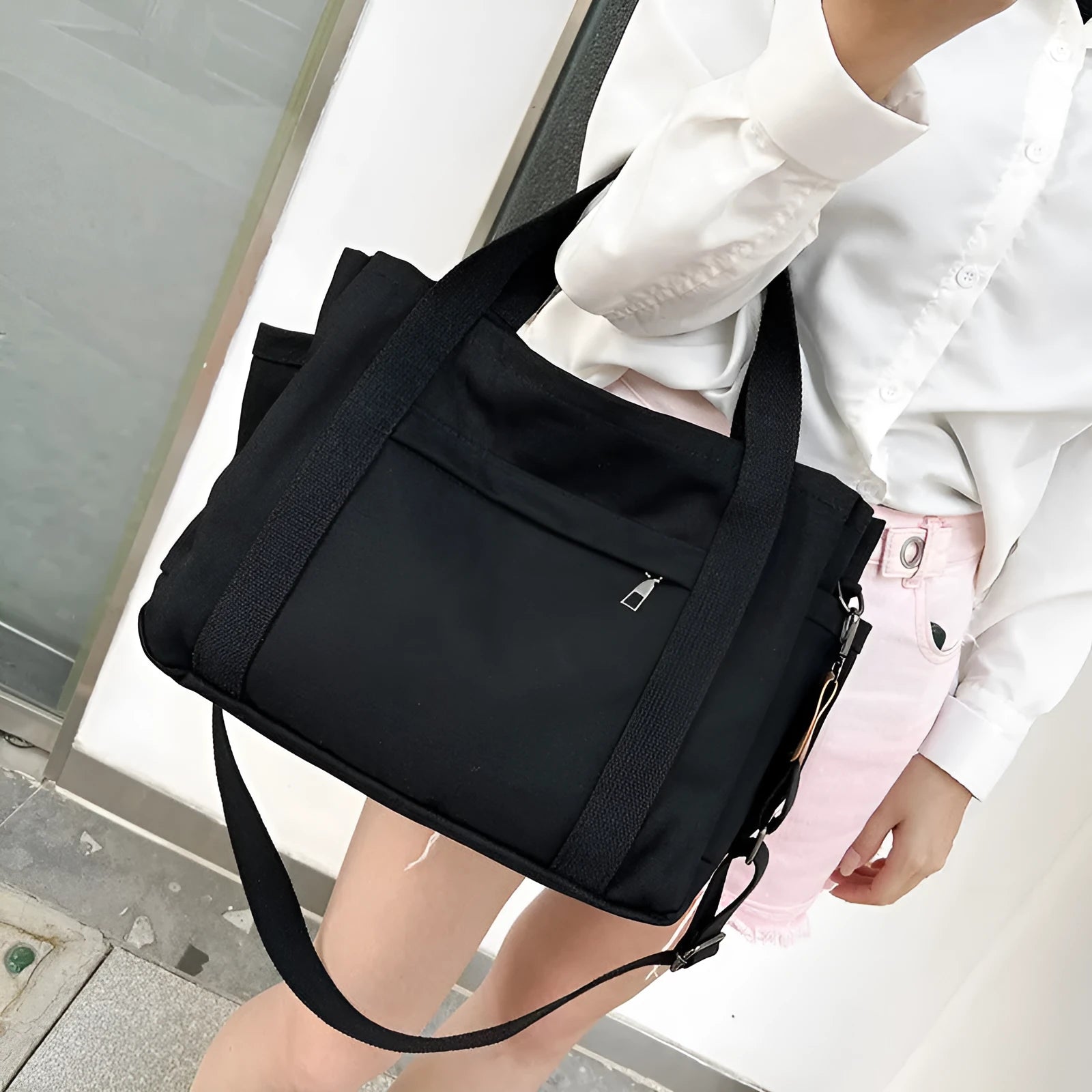 Large canvas tote bag with multiple internal compartments in horizontal square design