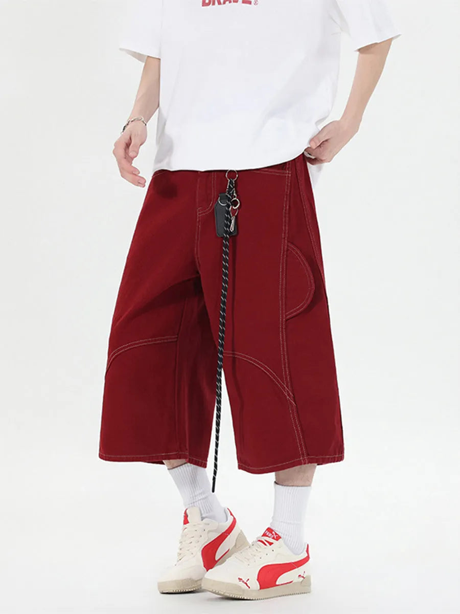 Retro multi-pocket denim workwear shorts in wide leg cropped design shown in red and black colours