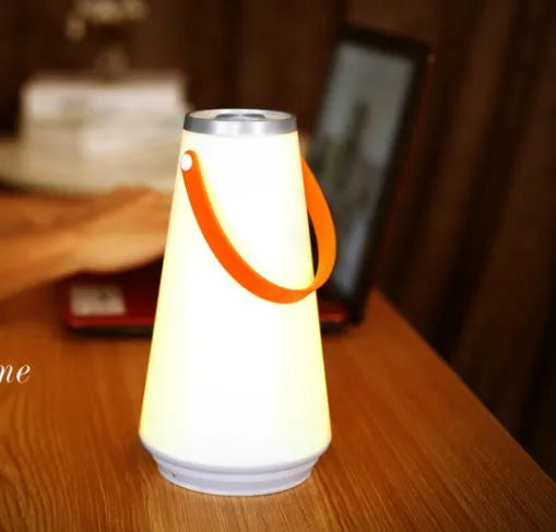 White rechargeable LED table lamp with square base and warm light illumination