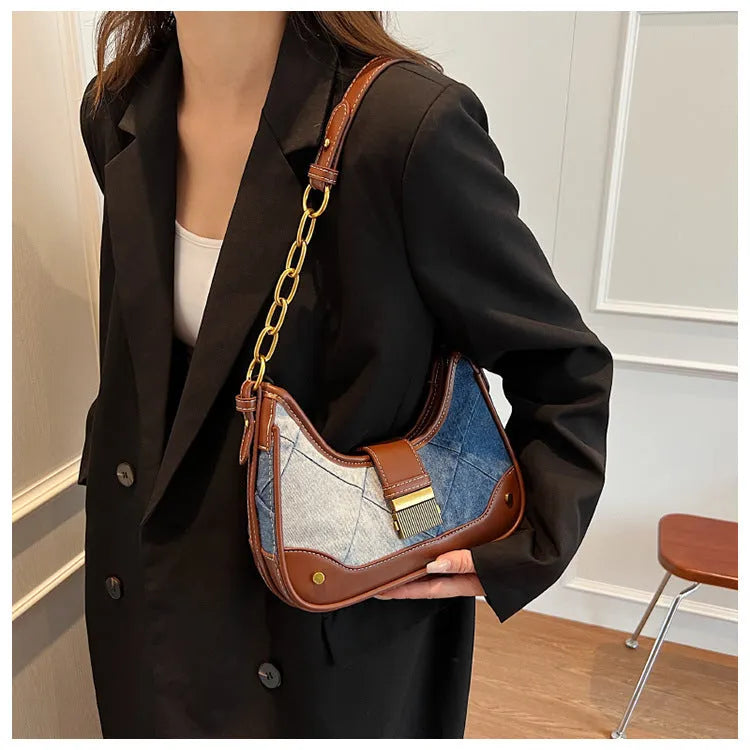 Brown denim women's bucket shoulder bag with diamond chain straps and lock detail