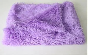 Soft plush dog blanket for kennel in grey colour showing wool polyester material