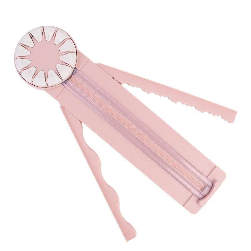 Pink and black 12-in-1 multifunctional dotted paper cutting machine for crafts.