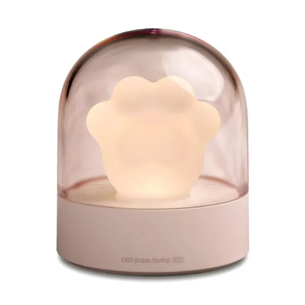 Grey cat paw shaped USB rechargeable night light with music box function on wooden desktop