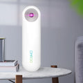 White portable UV sterilizer lamp with compact design for travel disinfection