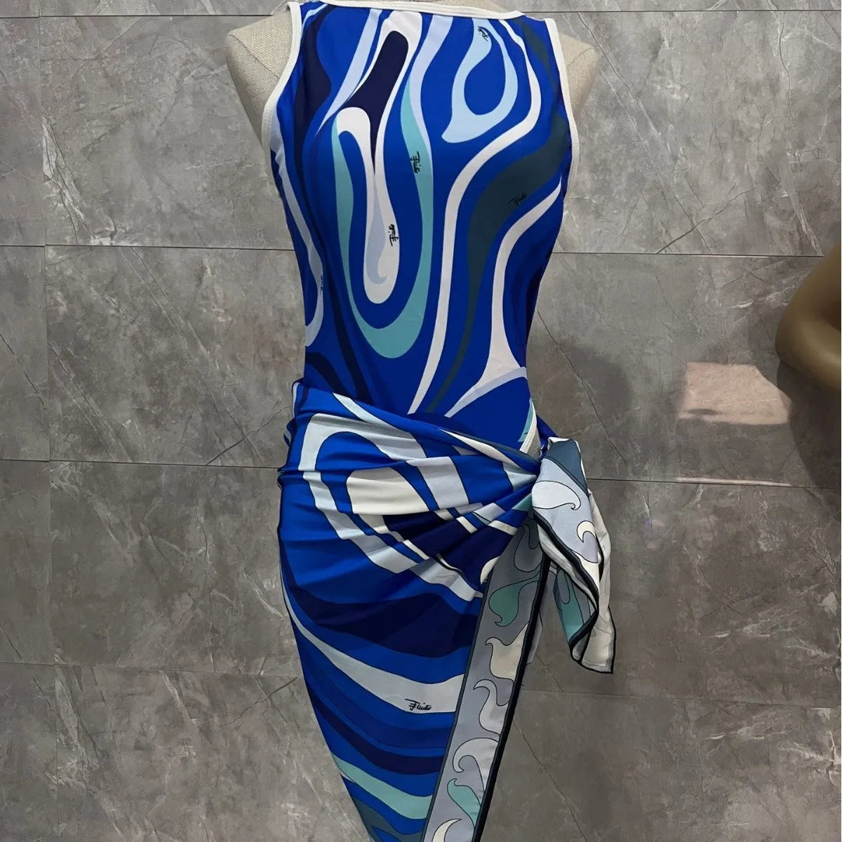 Women's striped polyester bikini set with square scarf in blue, front view, for swimming and wading