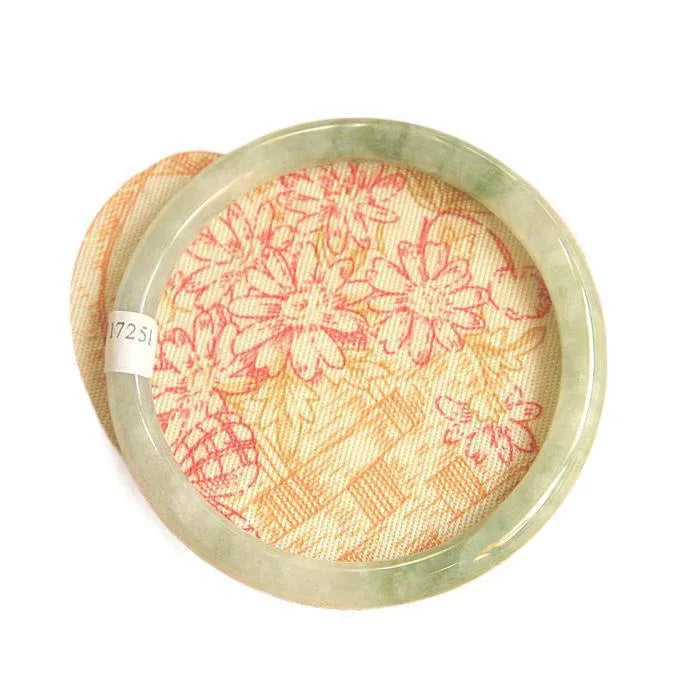 Green jade waxy student bracelet with geometric Chinese design showing adjustable sizing options