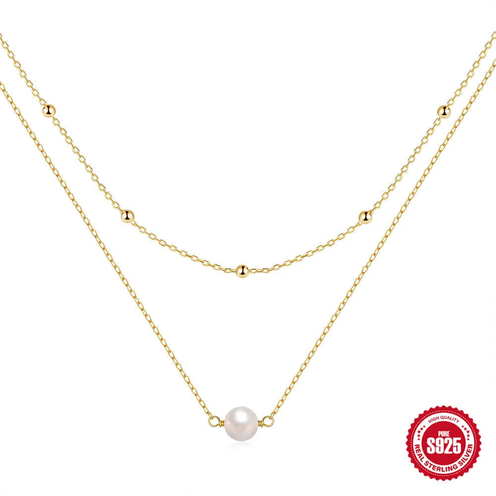 S925 sterling silver double layer women's necklace with geometric pearl pendant in gold or white gold.