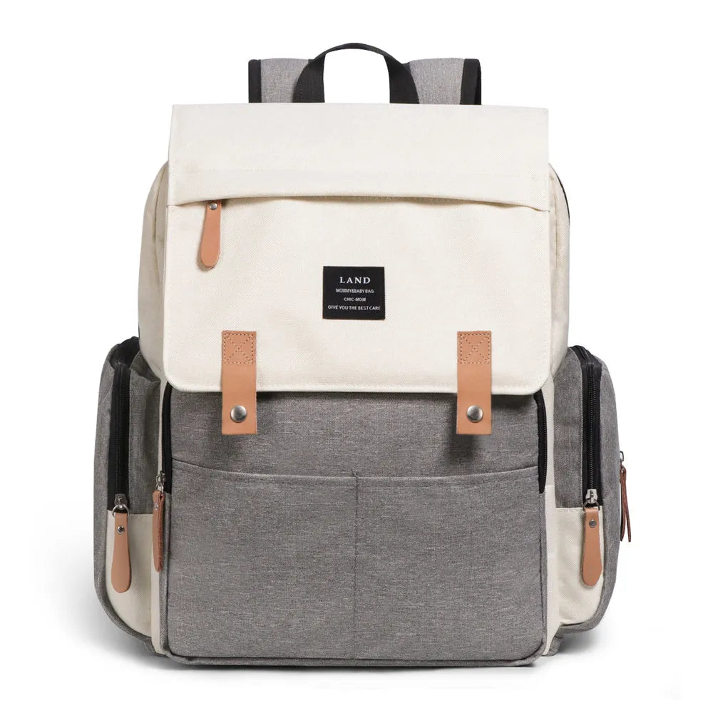 LAND Mommy large capacity oxford cloth diaper backpack with changing mat in beige colour.