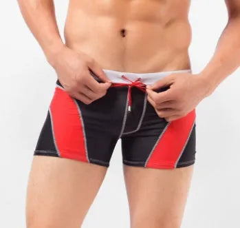Men's anchor string swim shorts in solid colour with polyester and spandex fabric, adjustable drawstring waist, available in multiple sizes