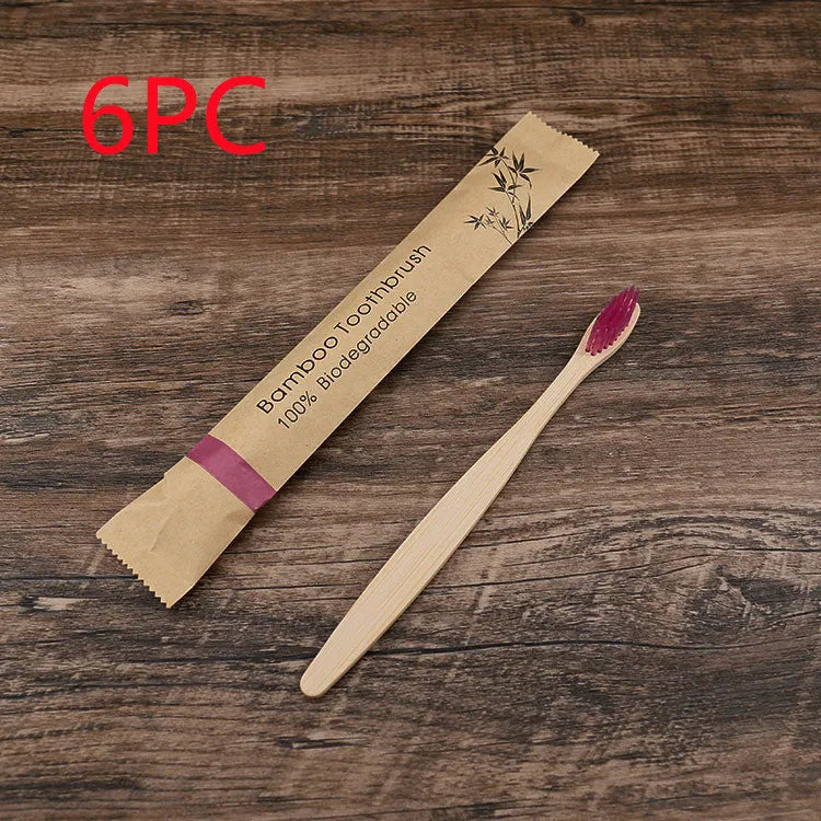 Set of 10 colourful bamboo toothbrushes with charcoal bristles for sustainable dental care