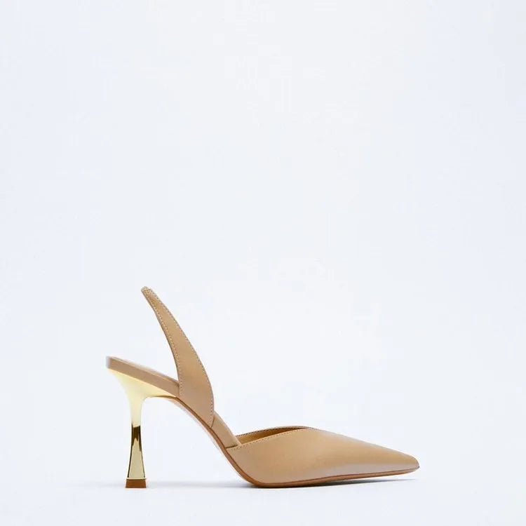 Nude patent leather pointed high heel shoe with shallow mouth, shown in apricot colour.