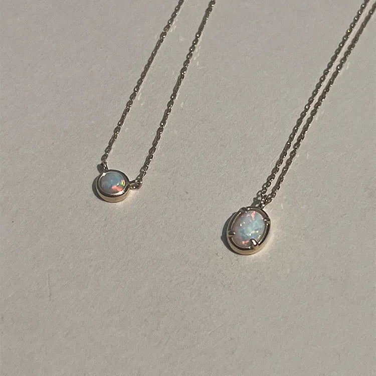 S925 sterling silver oval pendant necklace with a jelly opal stone, shown in gold and white gold plating options.
