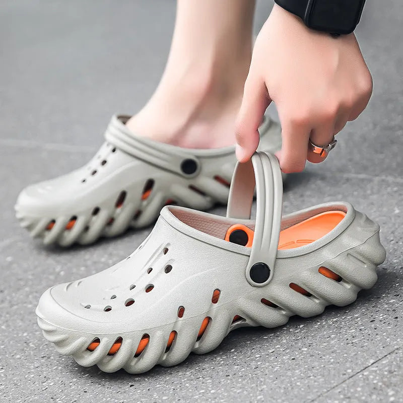 Men's beige EVA outdoor sandals with hollow-out design and non-slip sole.