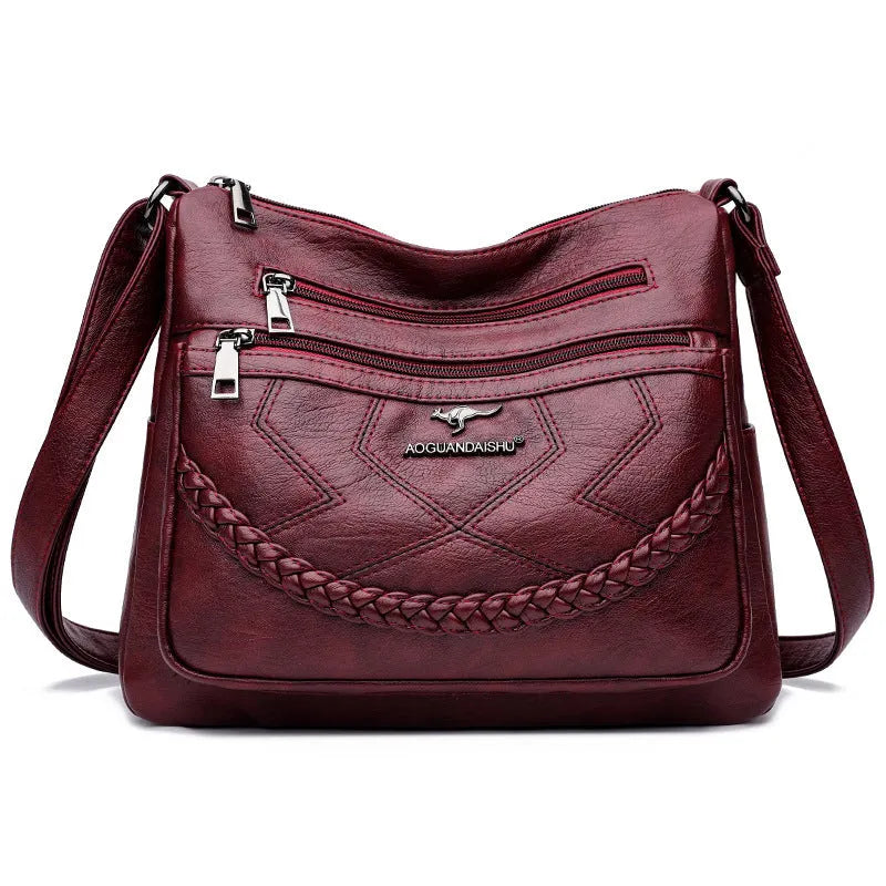 Soft leather shoulder bag in horizontal square shape with large capacity and internal zipper compartment
