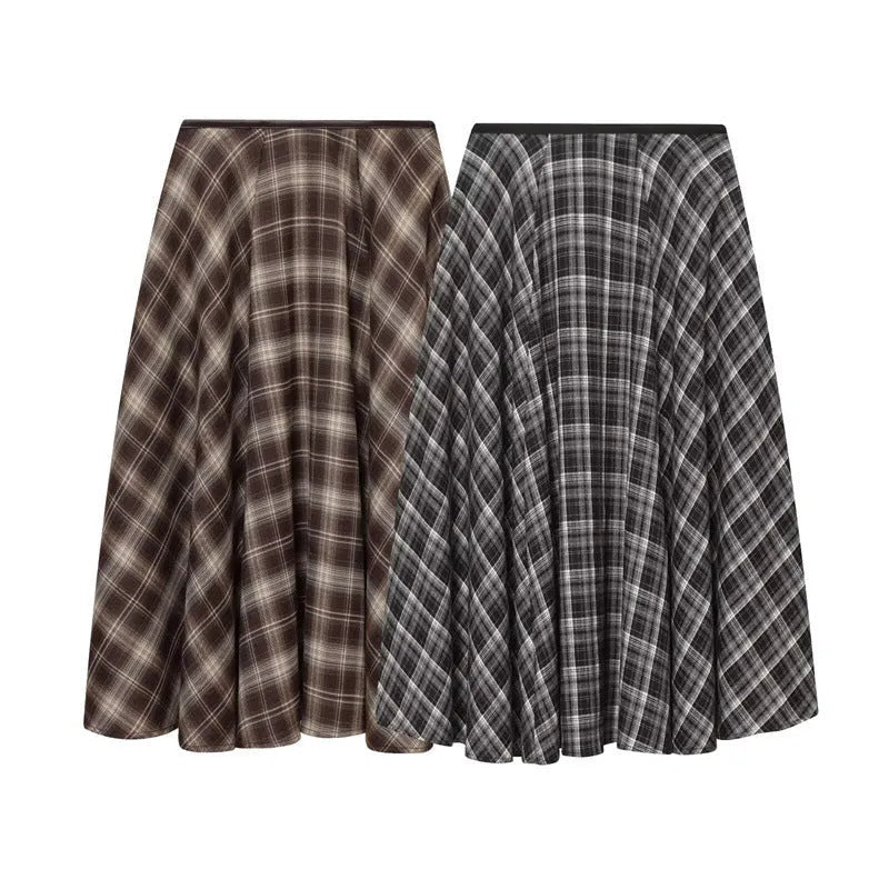 Women's loose plaid midi dress in brown with high-waisted half-skirt and check pattern on a white background
