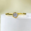 Minimalist silver crown-shaped ring with linear detailing in platinum or gold finish