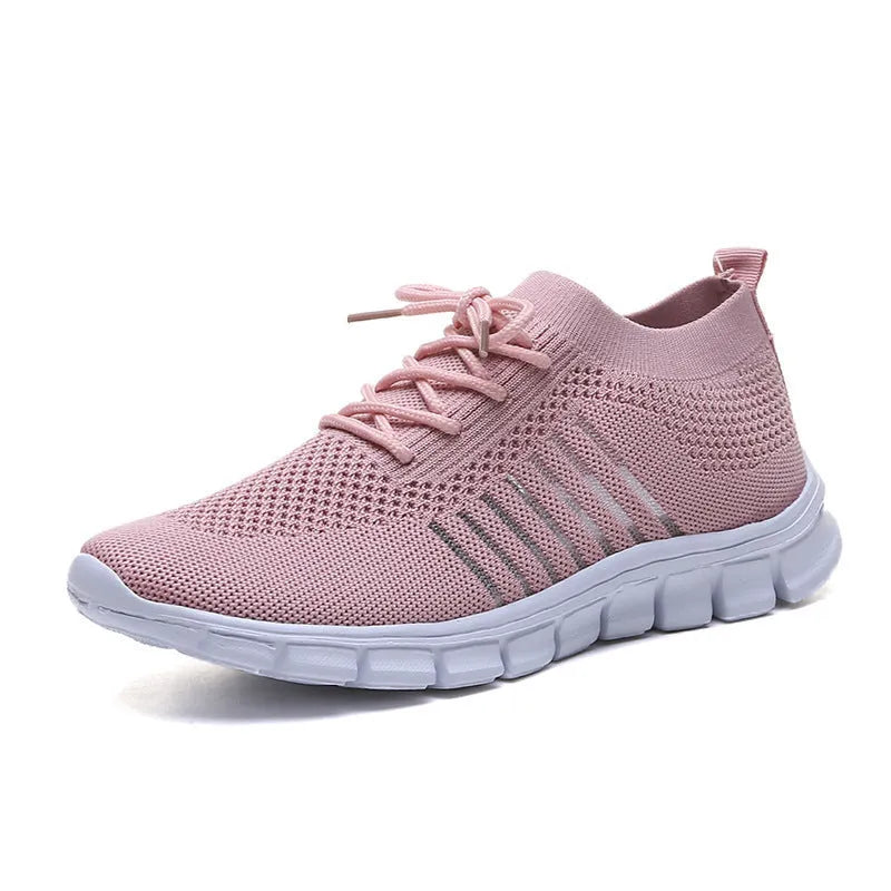 Ladies casual flat shoes in beige with breathable mesh upper, round toe, and front lace closure.