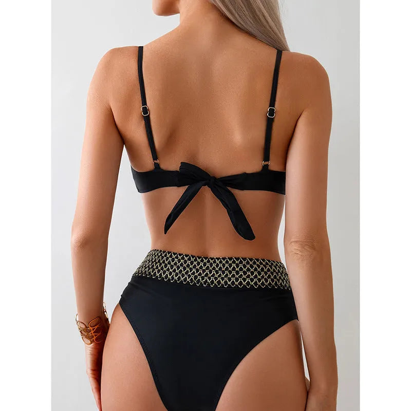 Black two-piece bikini swimsuit set with sleeveless top and brief-style bottoms on hanger