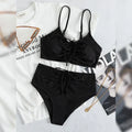 Black women's bikini swimsuit with high waist shorts and a sleeveless top on a mannequin.