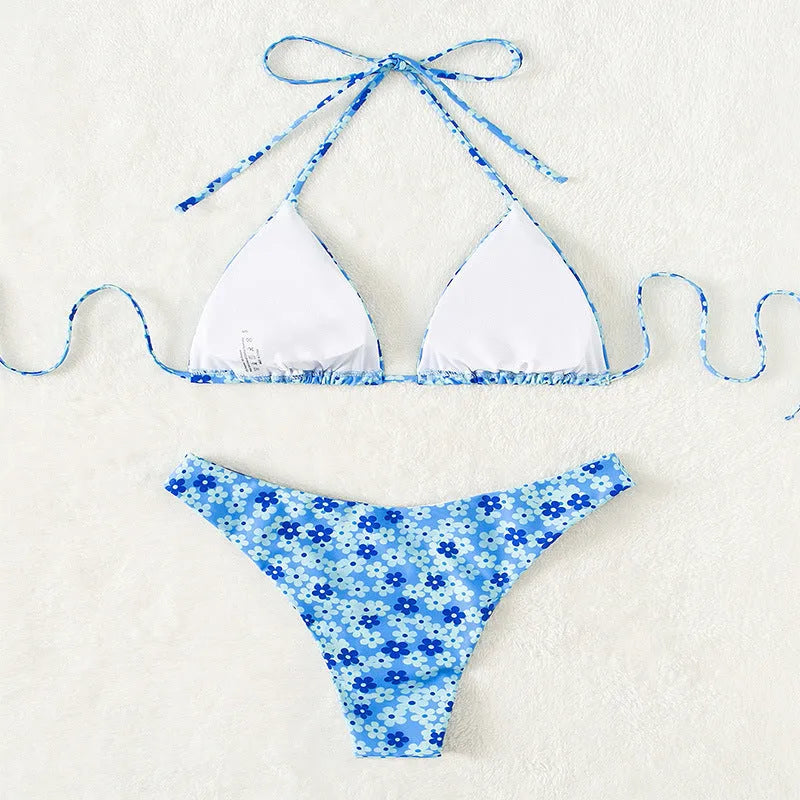 Women's blue swimsuit with lace-up front and matching side-split shorts