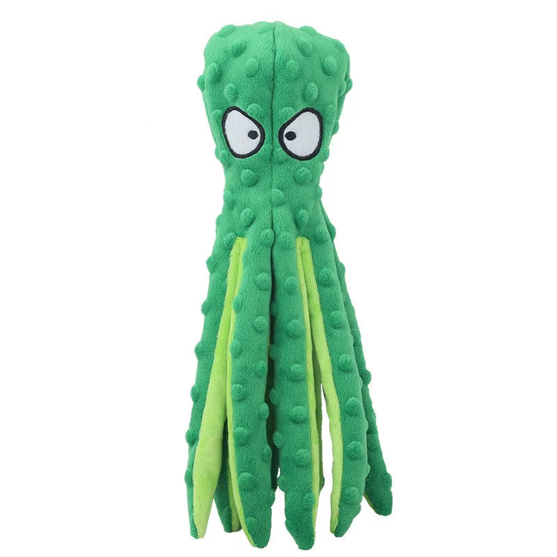Blue octopus-shaped plush dog toy with crinkle paper and squeaker features on a plain background.