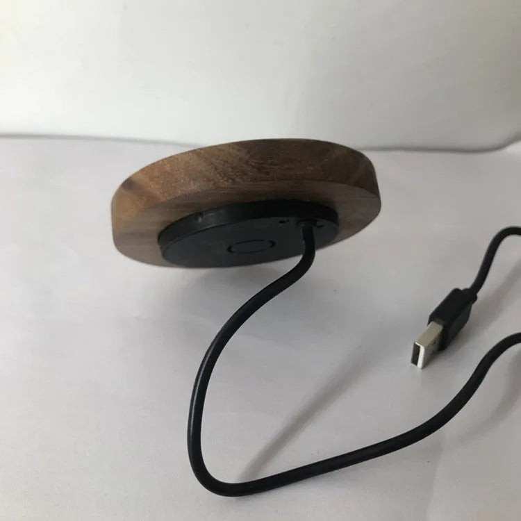 Black embedded wireless phone charger for furniture installation with 60mm diameter