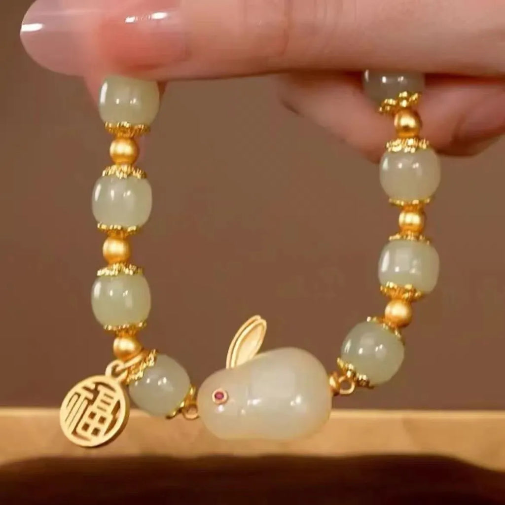 Green jade fu character lucky bracelet with hare charm on adjustable black cord