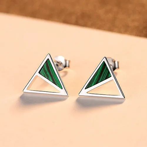 Green malachite stud earrings in silver with a geometric design and pure silver inlay gem setting
