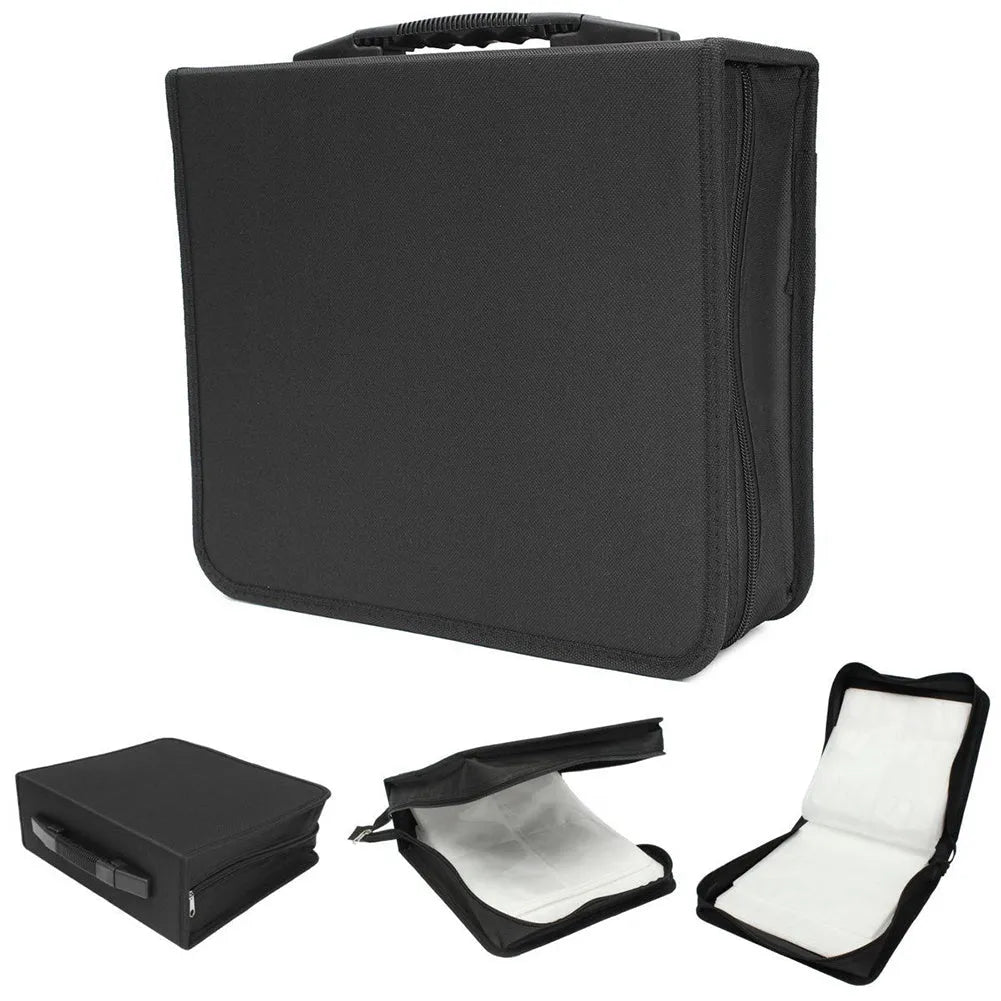 Black Oxford fabric CD DVD storage binder with zipper and top hand strap open to show disc sleeves.