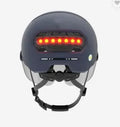 Cycling helmet with integrated LED brake light showing L and M size options