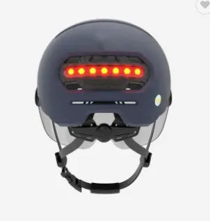 Cycling helmet with integrated LED brake light showing L and M size options