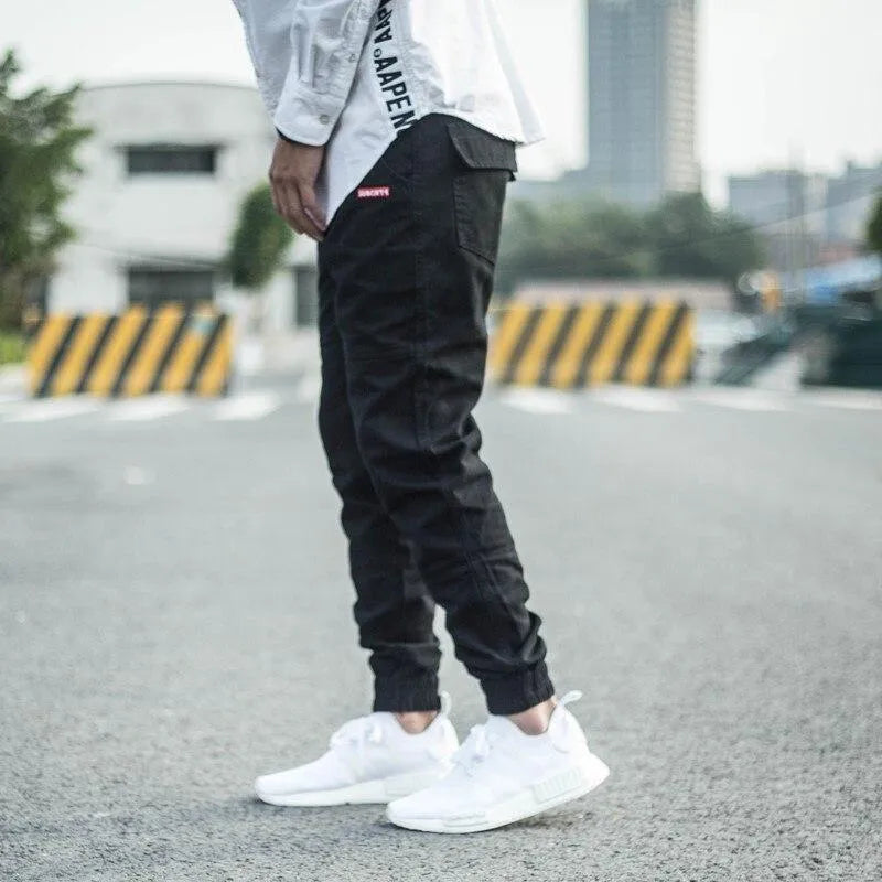 Men's casual tight-fit pencil trousers in khaki with zipper front and mid-rise waist