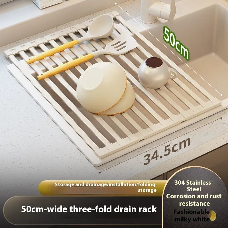 Foldable milky white stainless steel kitchen draining rack shown open and folded, next to a sink.