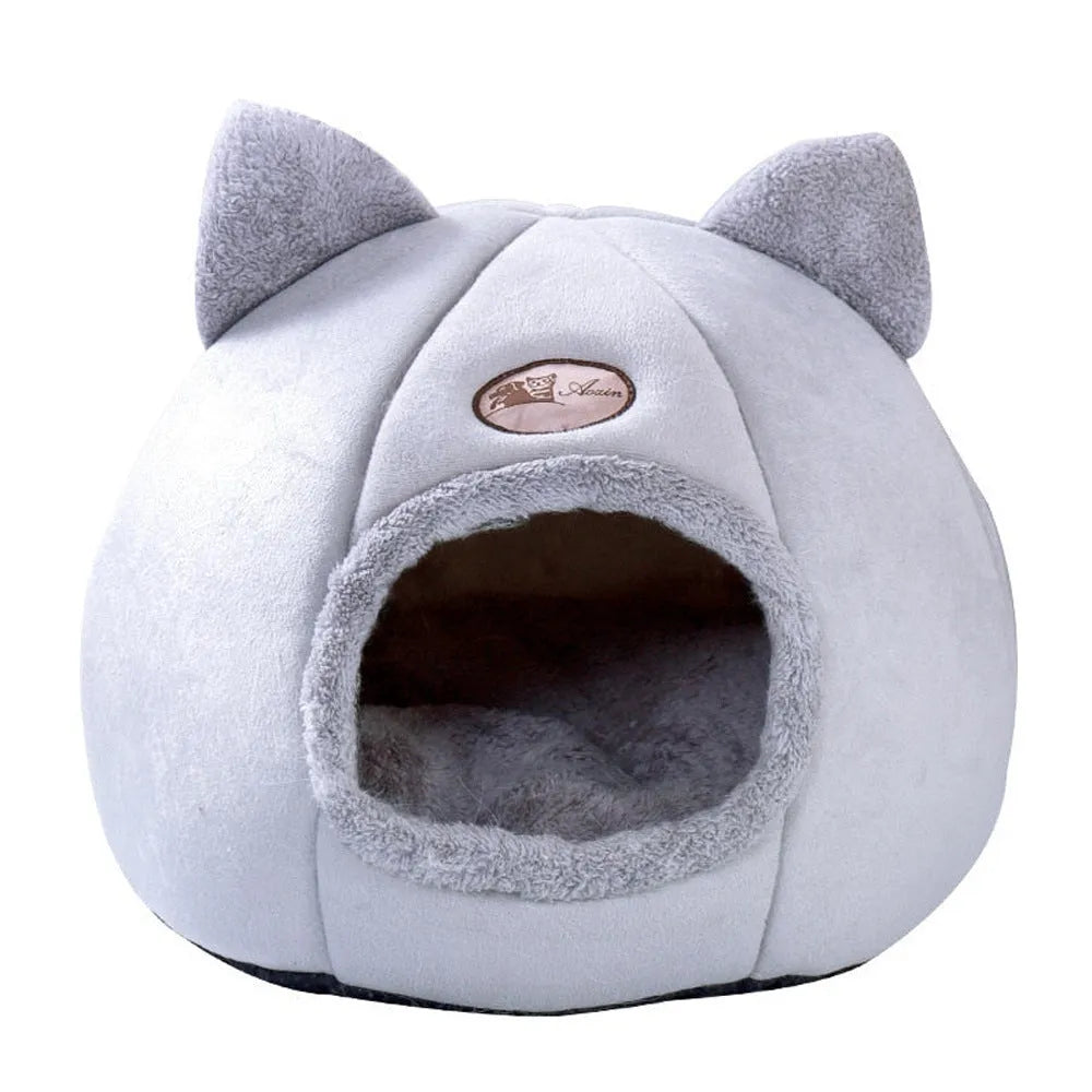 Large enclosed winter cat sofa bed with plush lining for indoor pet warmth