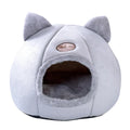 Large enclosed winter cat sofa bed with plush lining for indoor pet warmth
