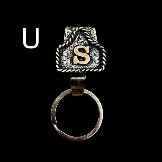Handmade metal cow tag belt keychain in rustic design with multiple colour options