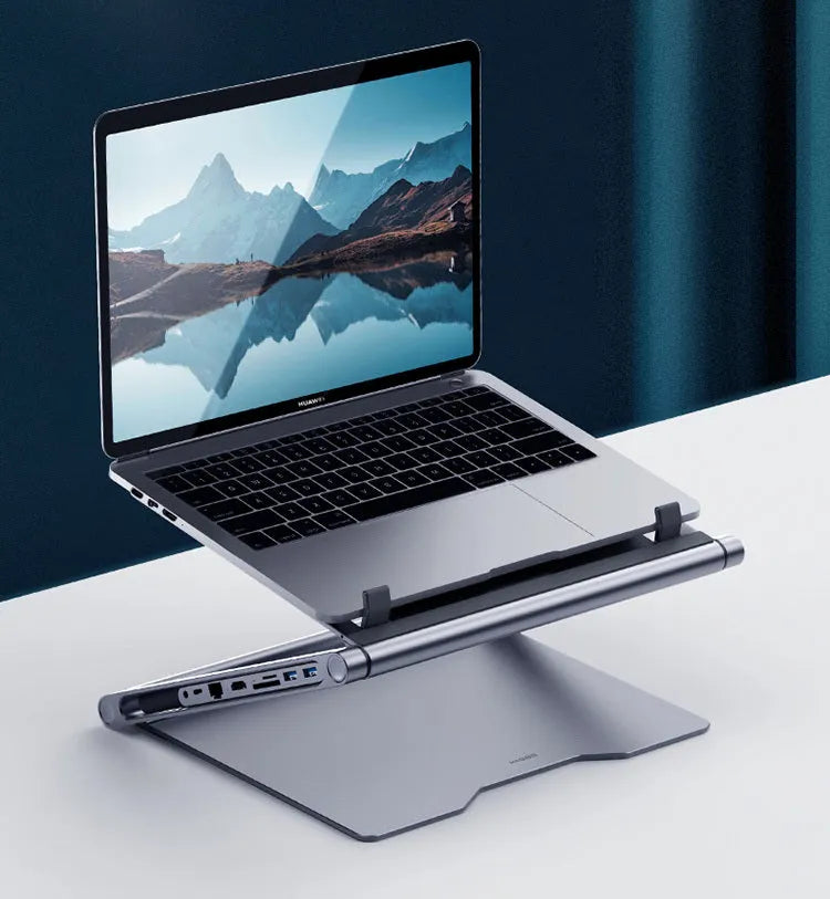 Aluminium alloy laptop stand with 8-in-1 docking station in deep space grey, cave-type design with silicone pads