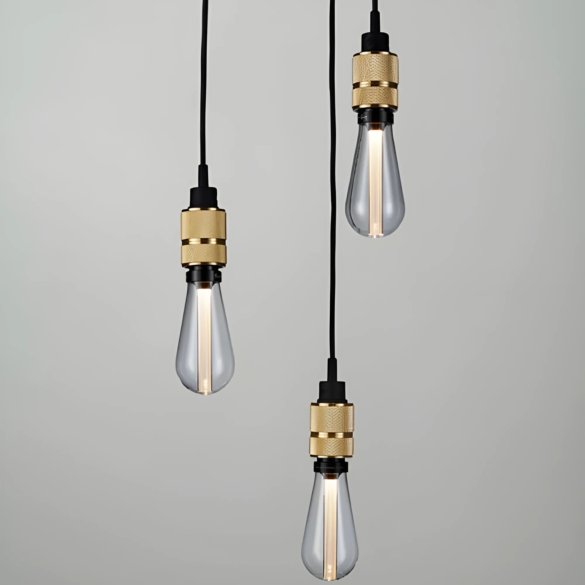 DIY retro chandelier assembly kit showing braided power cord and electroplated lamp holder in chrome finish.