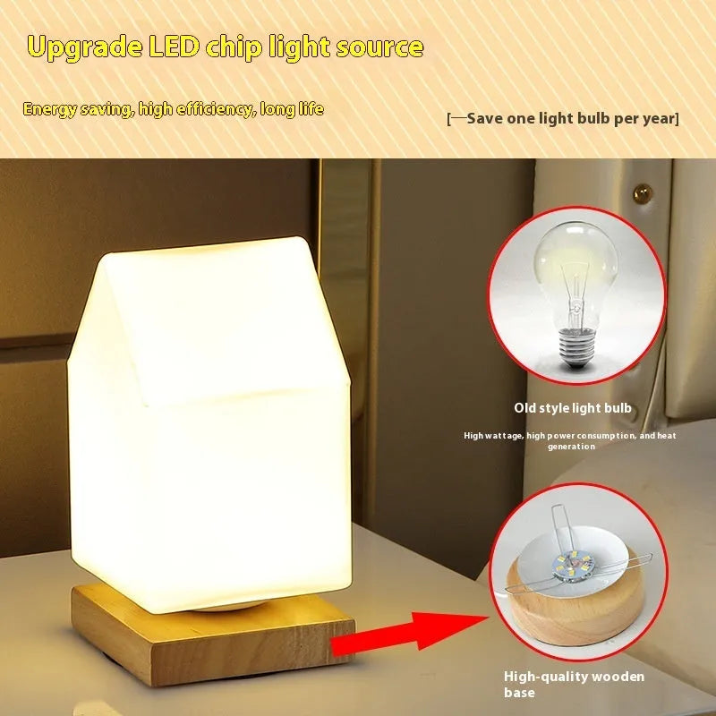 Nordic white geometric table lamp with solid wood base and USB charging port on a wooden desk.